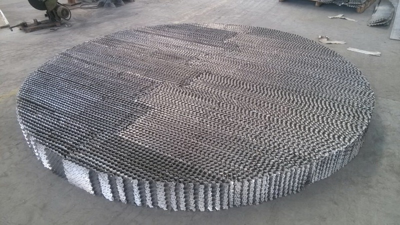 Orifice plate corrugated structured packing